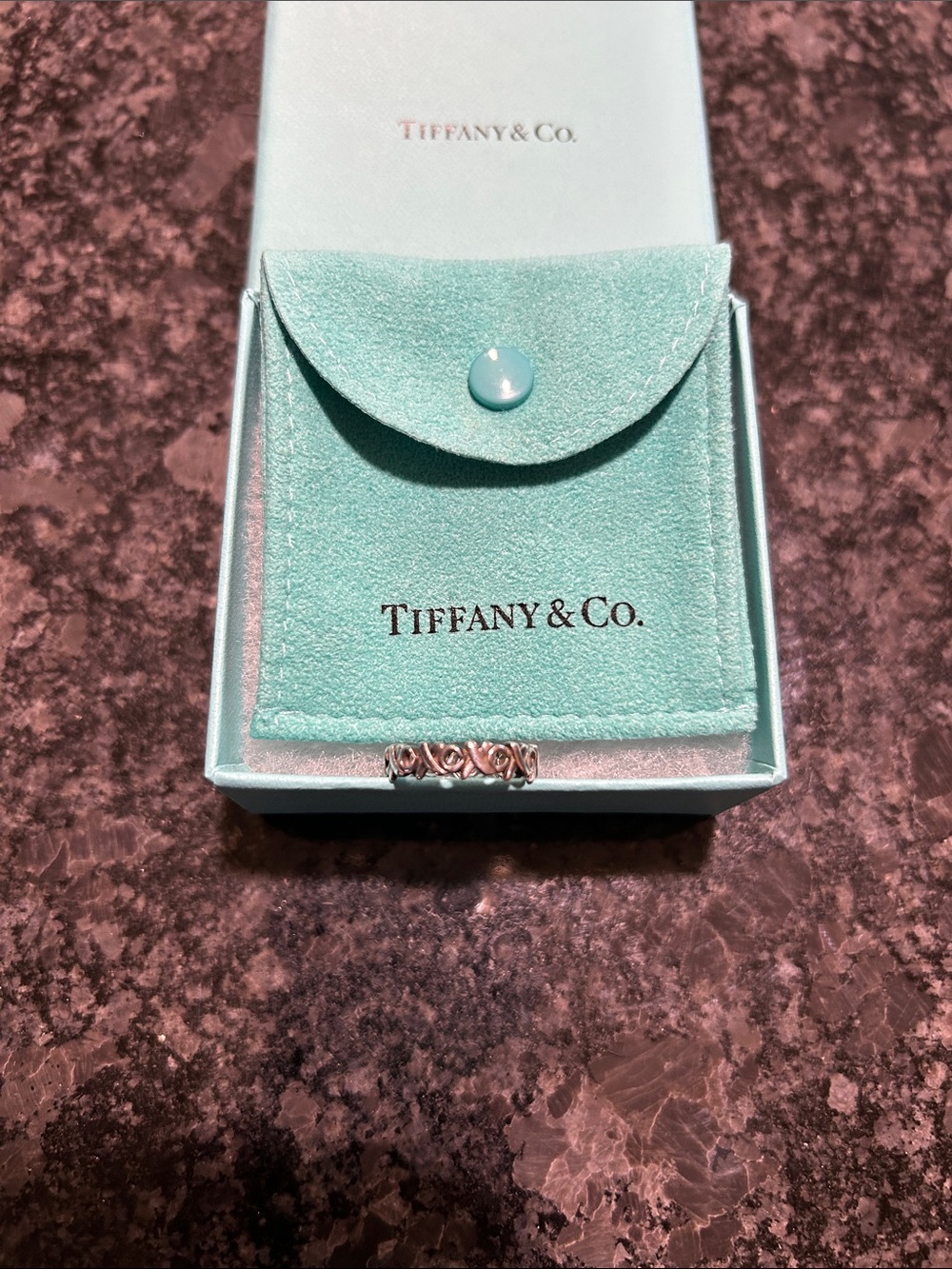Tiffany & Co. Xoxo sterling silver ring with in Iconic Tiffany Blue pouch & box